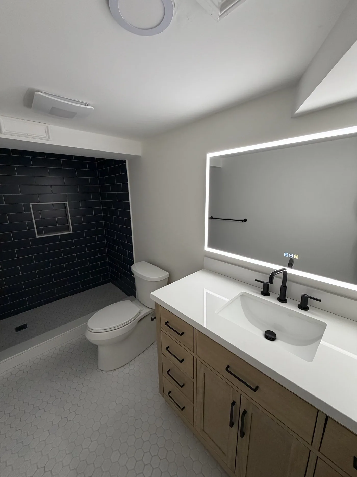 Custom basement bathroom by Maitland Builders